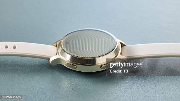 Detail of a Garmin Lily Active 2 smartwatch for women, with a silicone band.