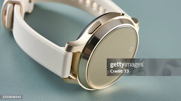 Detail of a Garmin Lily Active 2 smartwatch for women, with a silicone band.