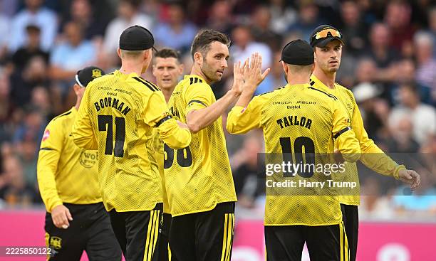 Matthew Taylor of Gloucestershire celebrates the wicket of Will Smeed of Somerset during the Vitality Blast Men match between Somerset and...