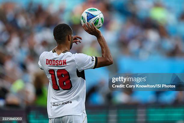 Derek Dodson of D.C. United prepares a throw in during the first half of the match between Charlotte FC and D.C. United at Bank of America Stadium on...