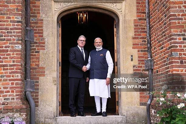 Britain's Prime Minister Keir Starmer welcomes Indian Prime Minister Narendra Modi at Chequers on July 24, 2025 in Aylesbury, England. British Prime...