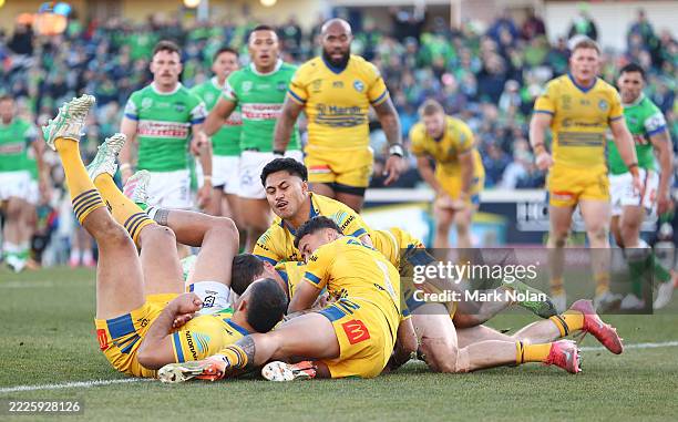 Nolan Stringer Simi Sasagi of the Raiders score a try during the round 20 NRL match ...