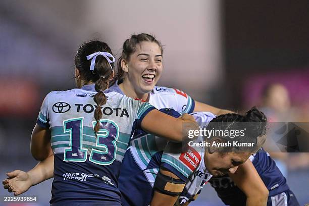 Bree Chester North Queensland Cowboys celebrates with her teammates after winning the round three NRLW match between Cronulla Sharks and North...