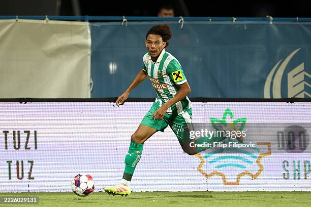 Janis Antiste of SK Rapid runs with the ball during the UEFA Conference League second qualifying round first leg match between Decic and SK Rapid at...