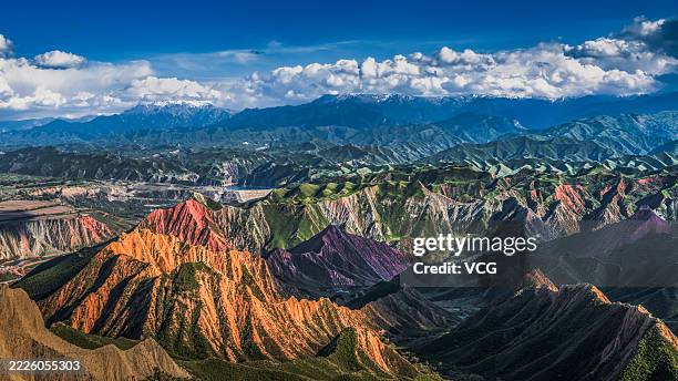 View of Danxia mountain ridges of Tianshan Mountains on May 12, 2025 in Tacheng, Xinjiang Uygur Autonomous Region of China.