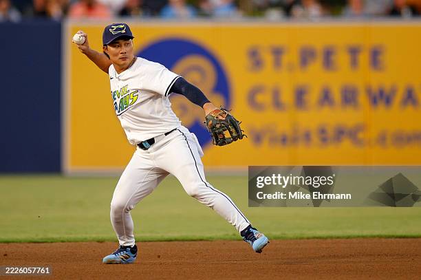 Ha-Seong Kim of the Tampa Bay Rays makes a throw to first in the third inning during a game against the Baltimore Orioles at George M. Steinbrenner...