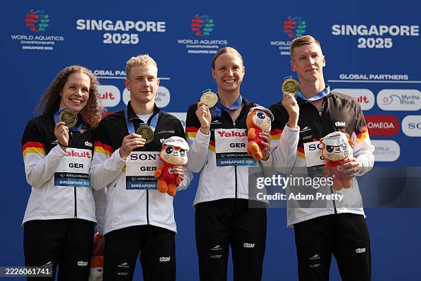 Gold medallists Celine Rieder, Oliver Klemet, Isabel Gose and Florian Wellbrock of Team Germany pose during the medal ceremony for the Mixed 4x1500m...