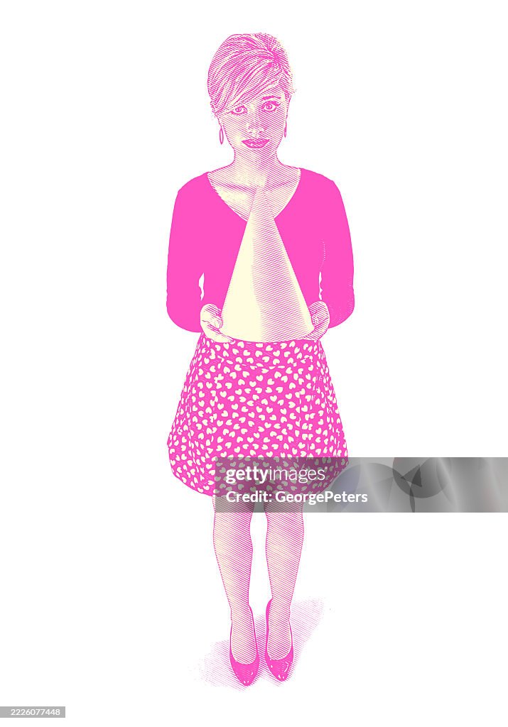 Young woman holding dunce cap