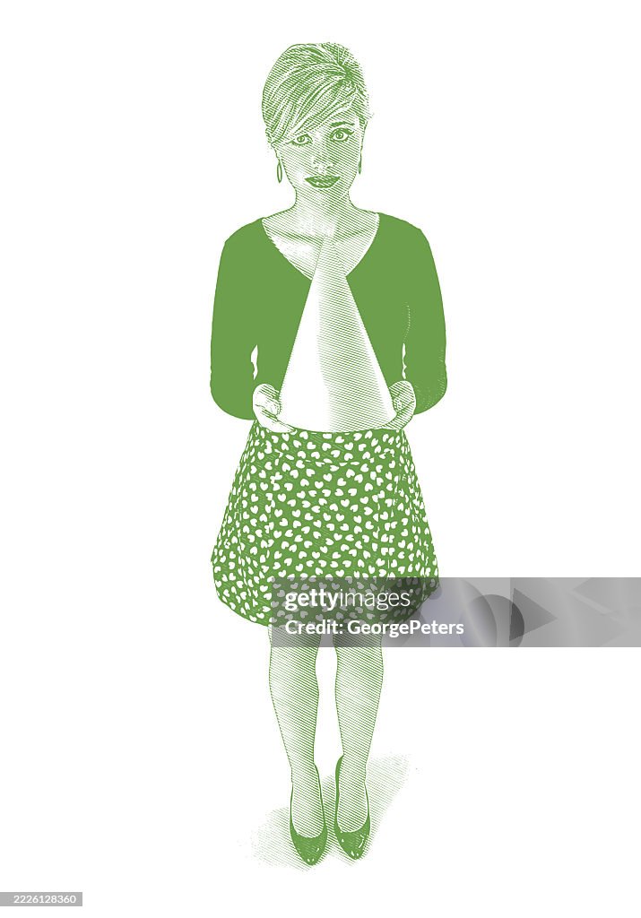 Young woman holding dunce cap