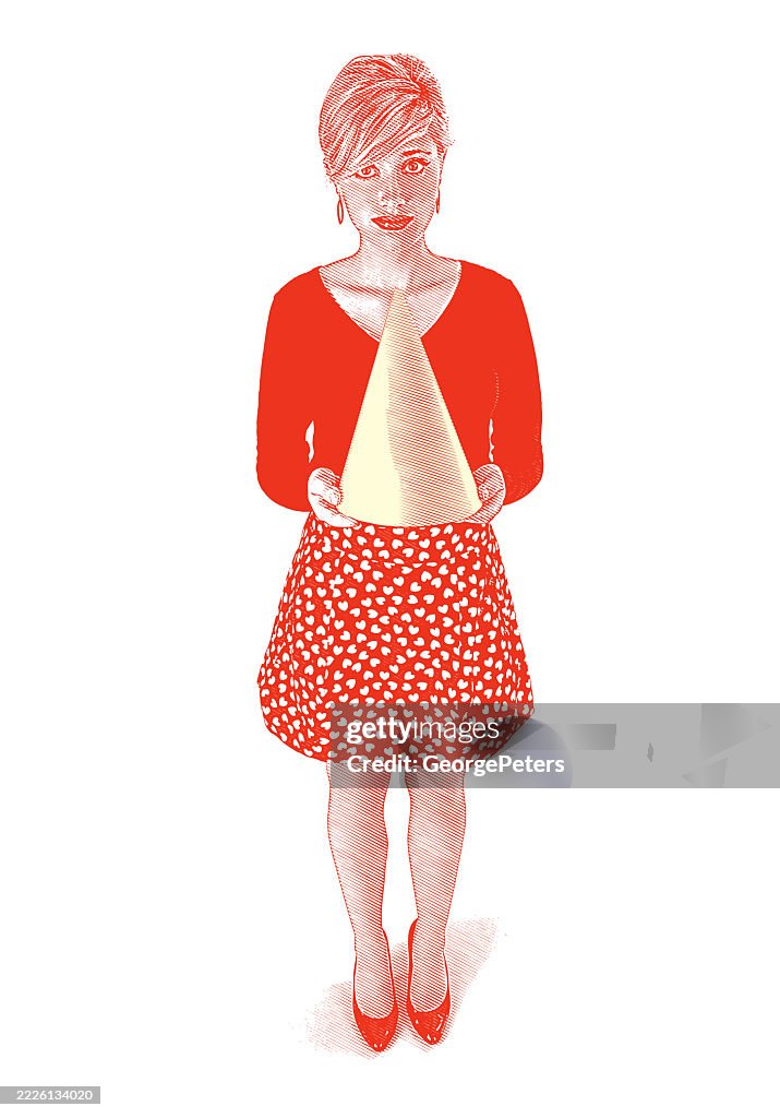 Young woman holding dunce cap