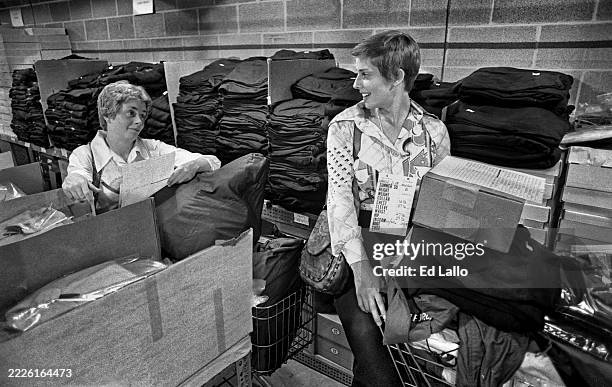 Air Force Academy Cadet Jane Chandler with classmate D. M Haase getting uniforms on June 28, 1976 in Colorado Springs, Colorado. She was one of the...