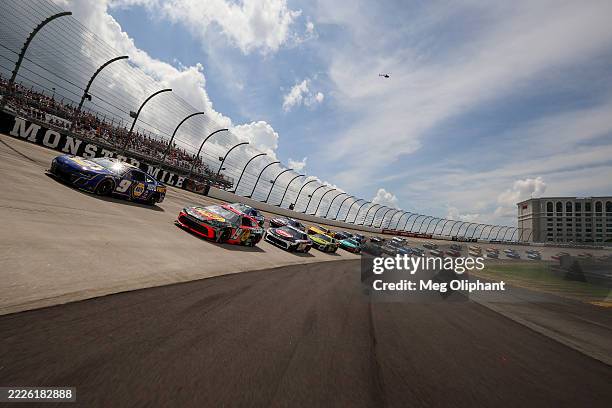 Chase Elliott, driver of the NAPA Auto Parts Chevrolet, and Chase Briscoe, driver of the Bass Pro Shops Toyota, lead the field on a pace lap prior to...