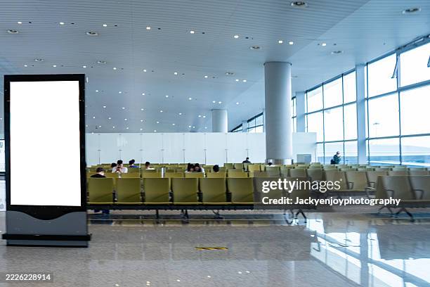 a blank billboard media display for advertising at the international airport. design mockup billboard with blank screen - the specification of xinjiang stock pictures, royalty-free photos & images