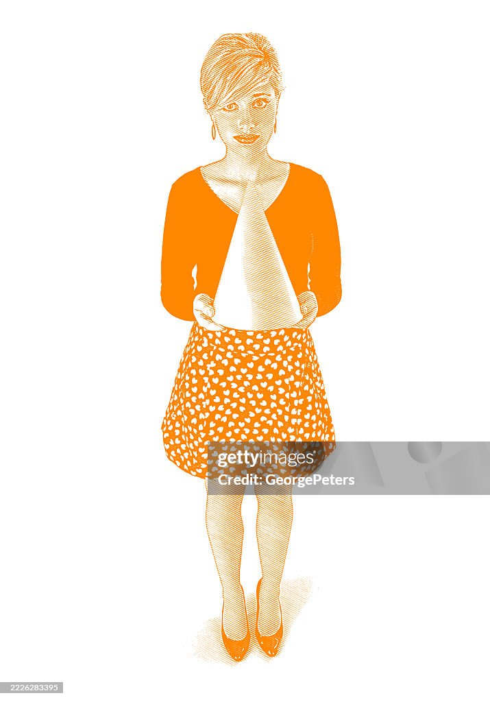 Young woman holding dunce cap