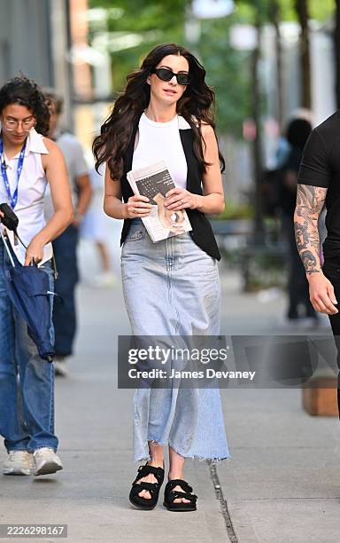 Anne Hathaway is seen on the set of 'The Devil Wears Prada 2' in Manhattan on July 21, 2025 in New York City.