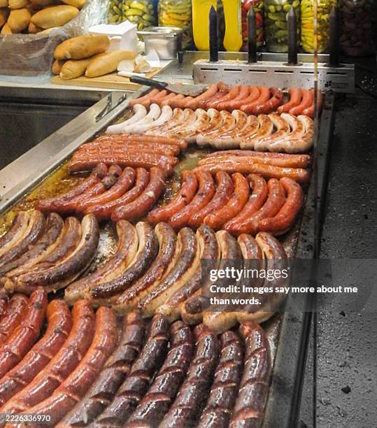 close up of various types of sausages sold in kiosks on the streets of vienna. - salsicha imagens e fotografias de stock