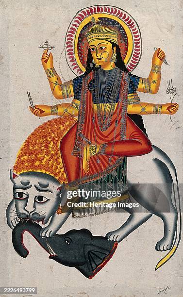 Durga riding on her lion killing a demon, . Creator: Unknown.