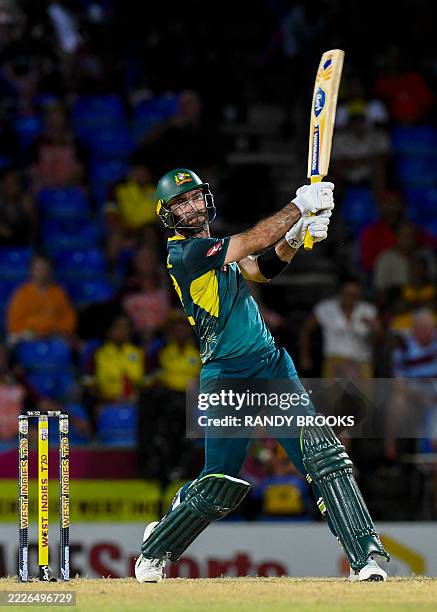 Glenn Maxwell of Australia hits 6 during the fourth Twenty20 international cricket match between West Indies and Australia at Warner Park Sporting...