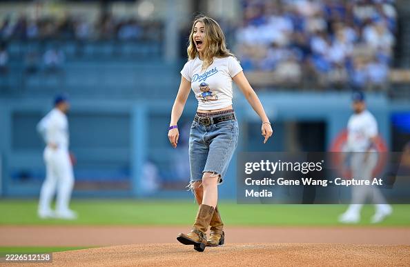 Emily Rudd Getty Emily Rudd throws the cerenoial first pitch for Los Angeles Dodgers ...