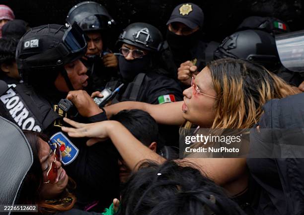Anti-gentrification protesters in Mexico City, Mexico, on July 26 clash with police on Avenida Juarez, Historic Center.
