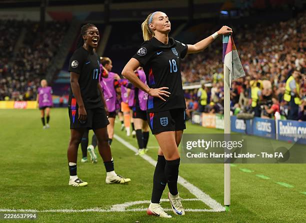 Chloe Kelly of England celebrates scoring her team's second goal from a rebound following a saved penalty in extra-time during the UEFA Women's EURO...