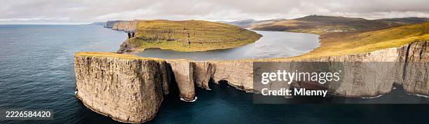 faroe islands sørvágsvatn lake over the north atlantic ocean vagar island panorama - crevice stock pictures, royalty-free photos & images