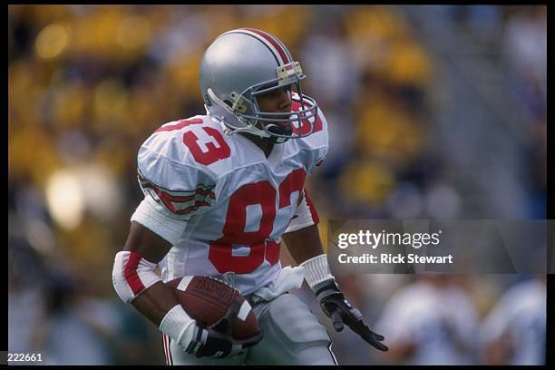 Wide receiver Terry Glenn of the Ohio State Buckeyes runs during a game against the Pittsburgh Panthers at Pitt Stadium in Pittsburgh, Pennsylvania....