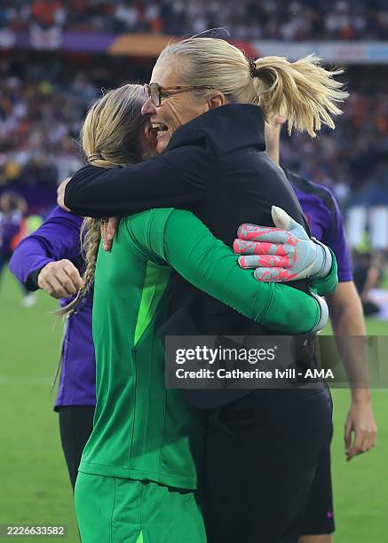 England Head Coach/Manager Sarina Wiegman celebrates with Hannah Hampton during the UEFA Women's EURO 2025 Final match between England and Spain at...