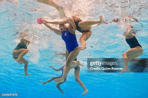 Maria Myriokefalitaki of Team Greece is challenged by an opponent in the Women's Water Polo Gold Medal match between Greece and Hungary on day 13 of...