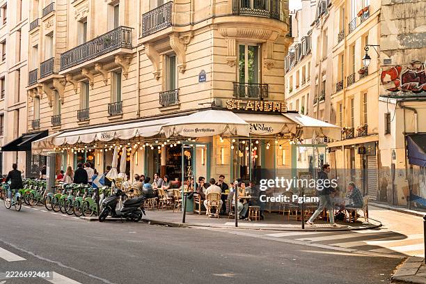 paris france outdoor patio cafe restaurant in historic st germain district - charming stock pictures, royalty-free photos & images