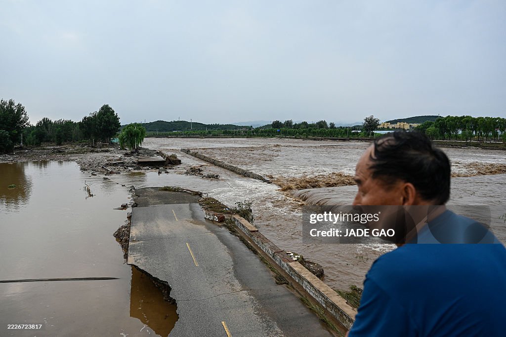 TOPSHOT-CHINA-ENVIRONMENT-WEATHER-FLOODS