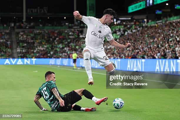 Max Arfsten of Columbus Crew and MLS All-Star is tackled by Gustavo Ferrareis of Atlas and LIGA MX All-Star during the 2025 MLS All-Star Game at Q2...