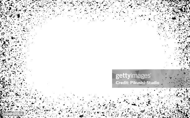 grainy grunge texture frame on white background. black and white grunge urban texture vector with copy space. - eroded texture stock illustrations