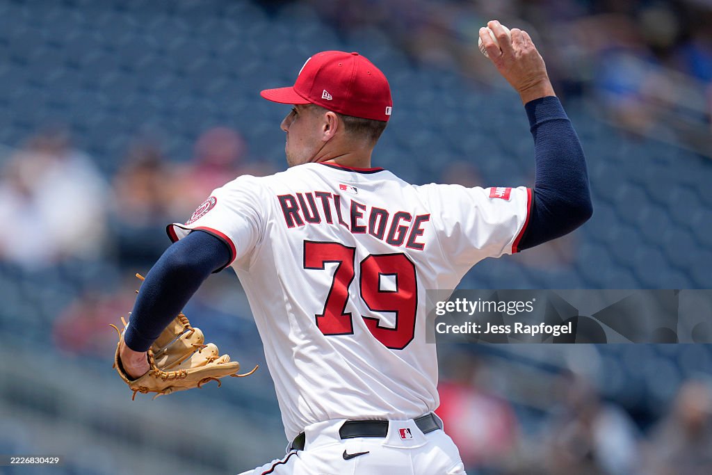 Jackson Rutledge Topps Jackson Rutledge of the Washington Nationals pitches to the... News ...