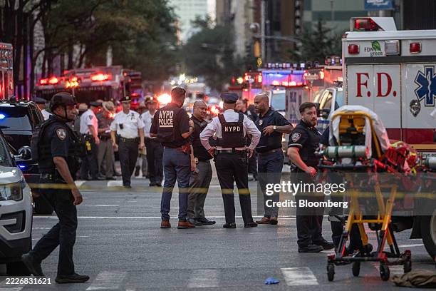 New York Police Department officers respond to the scene of a shooting at 345 Park Ave. In New York, US, on Monday, July 28, 2025. An active shooter...