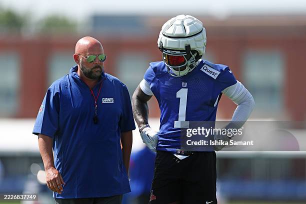 Head coach Brian Daboll and Malik Nabers of the New York Giants talk during training camp at Quest Diagnostics Training Center on July 24, 2025 in...
