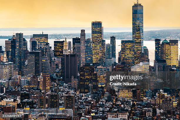 aerial view of the new york city skyline at sunset - golden hour stock pictures, royalty-free photos & images