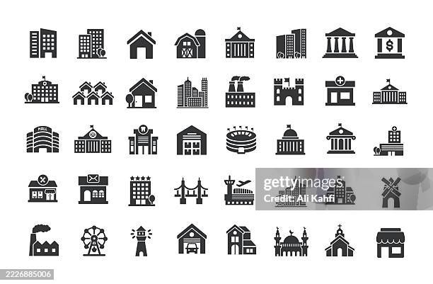 building glyph solid icons. containing house, residential, town, city solid icons collection - townhouse stock illustrations
