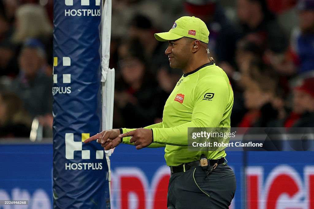 David Rodan Goal umpire David Rodan waves his flags for a goal in his 300th game ...
