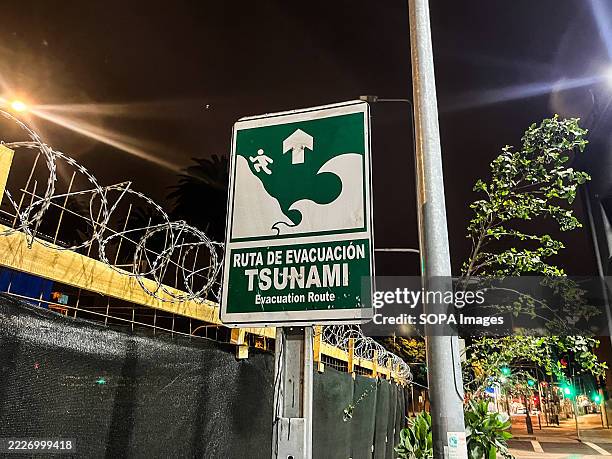 Sign of a Tsunami Evacuation Route is seen. Due to an earthquake in Russia, a tsunami warning has been issued for the Valparaiso region and Chile.
