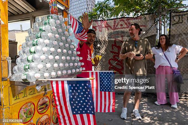 Vendor displays bottles of water on a day where the heat index is expected to top 100 degrees on July 25, 2025 in the Brooklyn borough of New York...