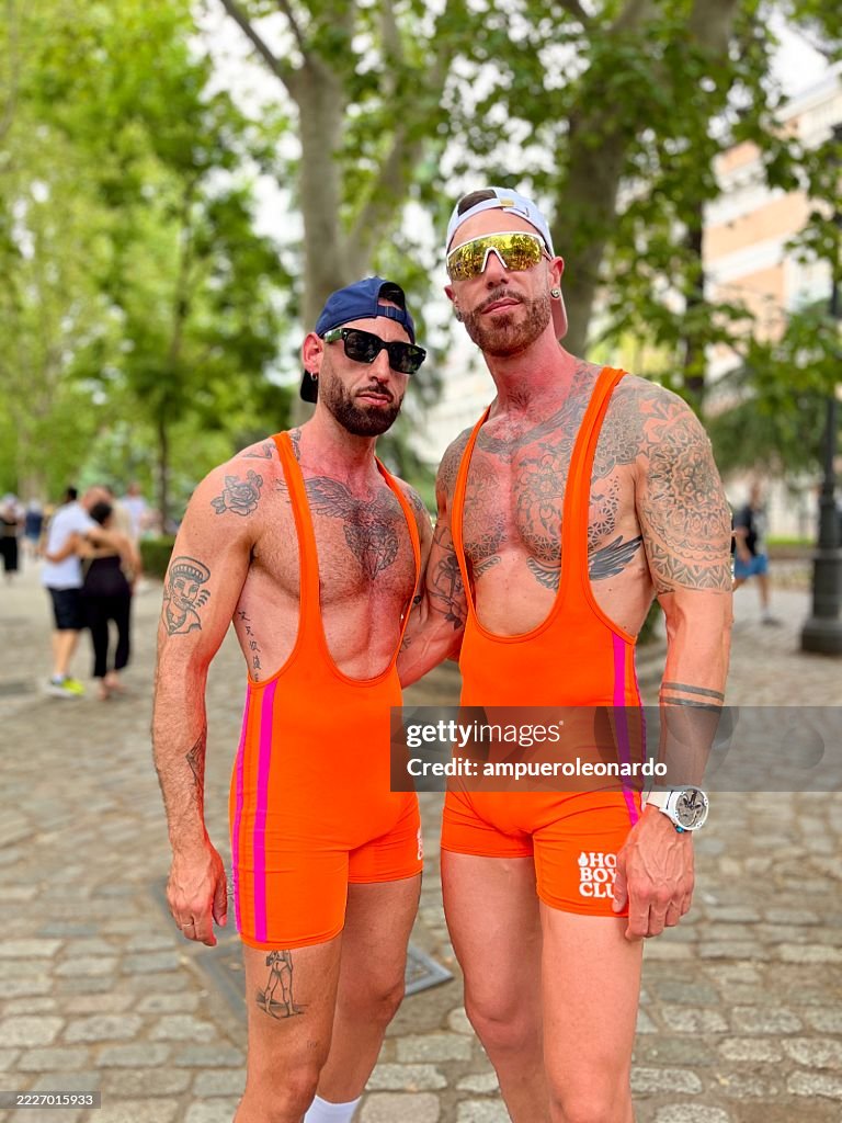 Celebrating Pride in Vibrant Orange Attire at Madrid Gay Pride