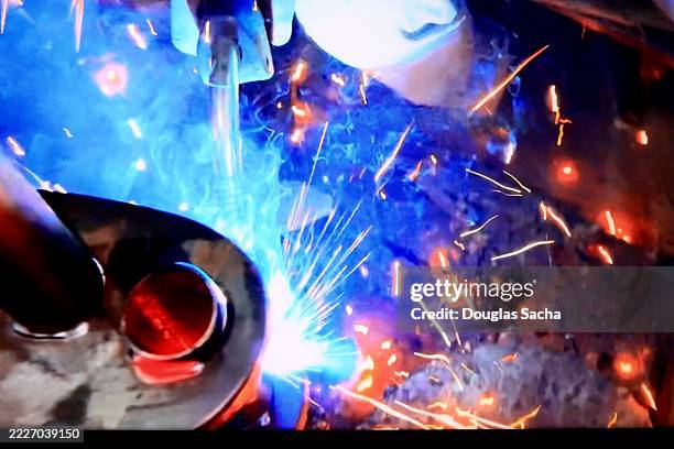 welding torch close-up - automatic welding torch stock pictures, royalty-free photos & images