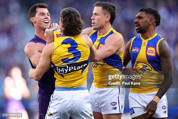 Jaeger O'Meara of the Dockers and Liam Baker of the Eagles wrestle during the round 20 AFL match between the Fremantle Dockers and West Coast Eagles...
