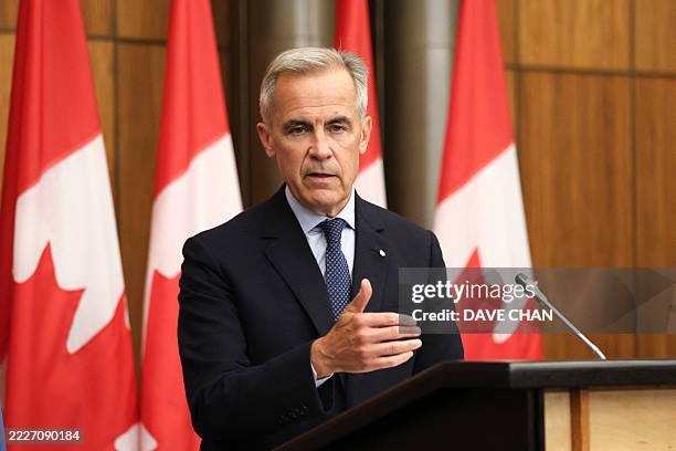 Canadian Prime Minister Mark Carney speaks during a press conference after a Cabinet meeting to discuss both trade negotiations with the US and the...