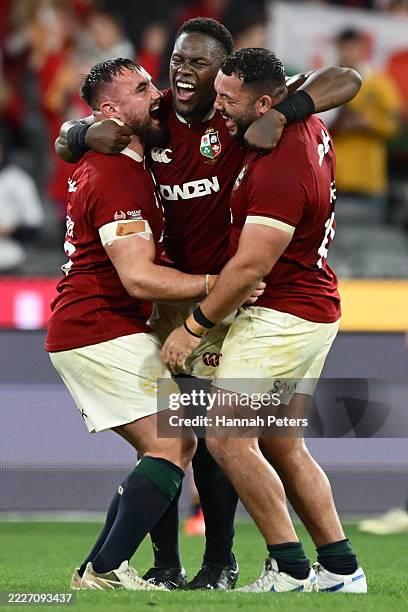 Ronan Kelleher, Maro Itoje and Ellis Genge of the British & Irish Lions celebrate victory following the second test of the series between Australia...
