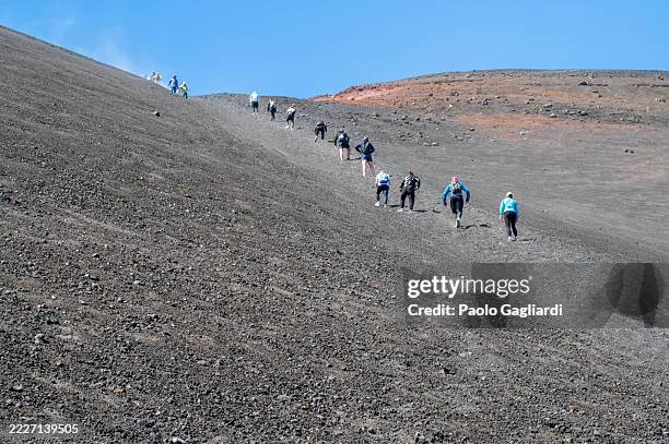 hikers on mount etna - etna stock pictures, royalty-free photos & images