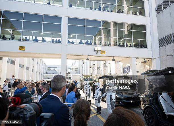 Astronauts Mike Fincke, Zena Cardman, JAXA astronaut Kimiya Yui, and Roscosmos cosmonaut Oleg Platonov, wearing SpaceX spacesuits, talk to family and...