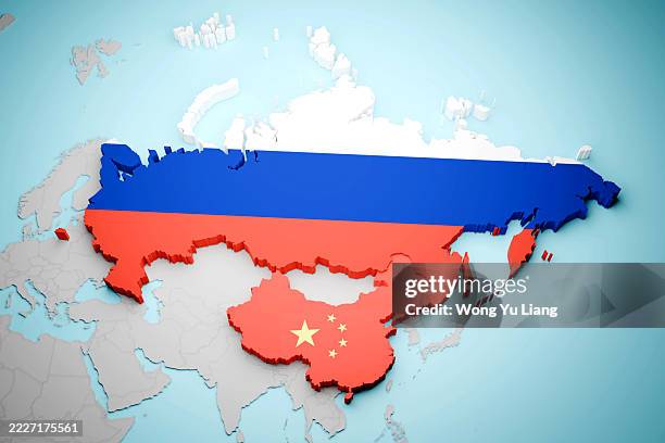 china and russia map with chinese and russian flags - east asia stock pictures, royalty-free photos & images