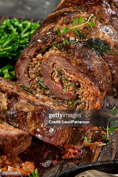 red pepper stuffed flank steak roulade - meat dish stock pictures, royalty-free photos & images